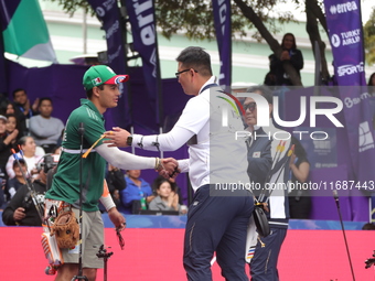 Kim Woojin of Korea and Matias Grande of Mexico compete during the Men's recurve semifinals match on the final day of the Tlaxcala 2024 Arch...