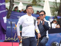 Kim Woojin of Korea competes against Matias Grande of Mexico (not in picture) during the Men's recurve semifinals match on the final day of...