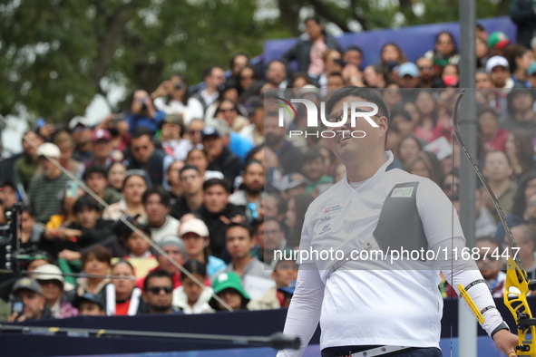 Kim Woojin of Korea competes against Matias Grande of Mexico (not in picture) during the Men's recurve semifinals match on the final day of...