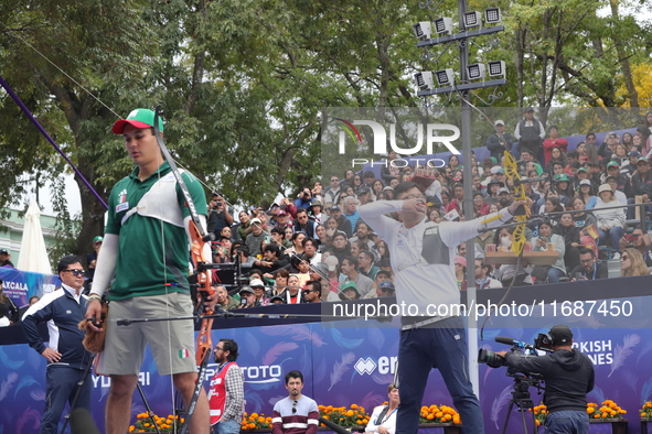 Kim Woojin of Korea and Matias Grande of Mexico compete during the Men's recurve semifinals match on the final day of the Tlaxcala 2024 Arch...