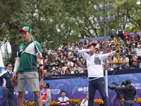 Kim Woojin of Korea and Matias Grande of Mexico compete during the Men's recurve semifinals match on the final day of the Tlaxcala 2024 Arch...