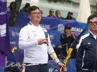 Kim Woojin of Korea competes against Matias Grande of Mexico (not in picture) during the Men's recurve semifinals match on the final day of...