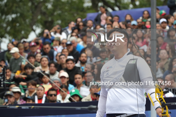 Kim Woojin of Korea competes against Matias Grande of Mexico (not in picture) during the Men's recurve semifinals match on the final day of...