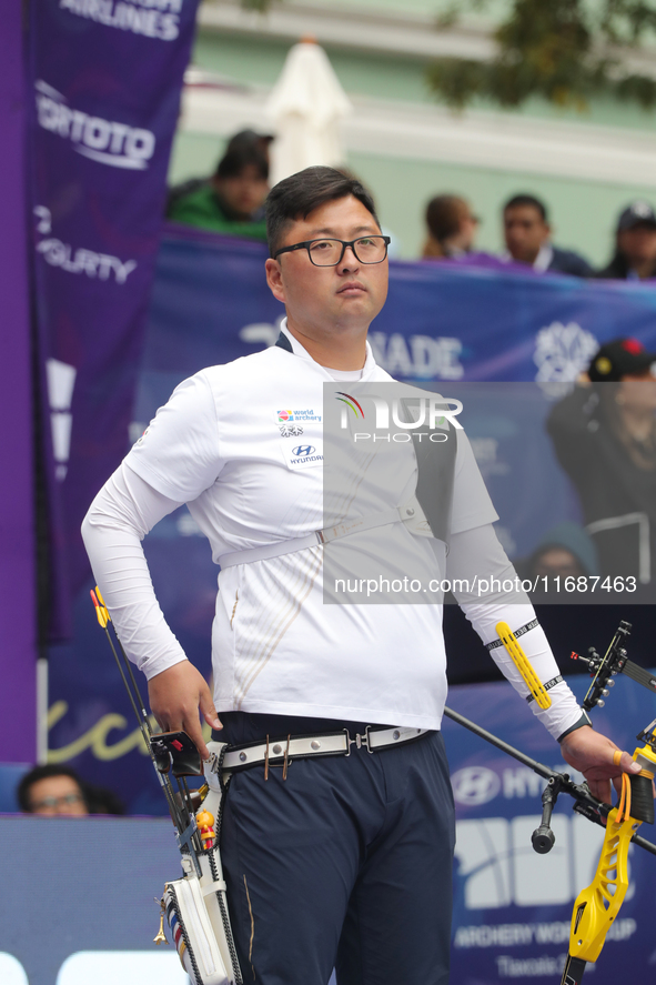 Kim Woojin of Korea competes against Matias Grande of Mexico (not in picture) during the Men's recurve semifinals match on the final day of...