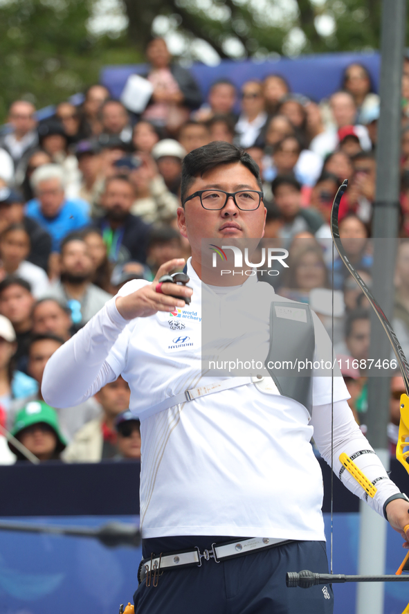 Kim Woojin of Korea competes against Matias Grande of Mexico (not in picture) during the Men's recurve semifinals match on the final day of...