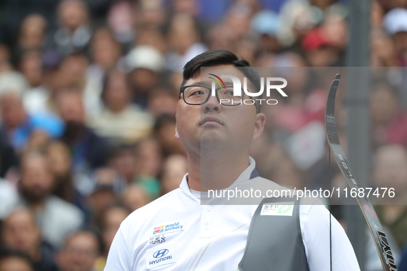 Kim Woojin of Korea competes against Matias Grande of Mexico (not in picture) during the Men's recurve semifinals match on the final day of...