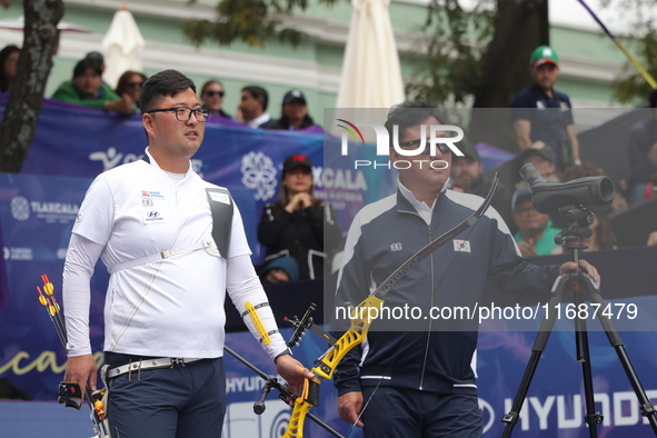 Kim Woojin of Korea competes against Matias Grande of Mexico (not in picture) during the Men's recurve semifinals match on the final day of...