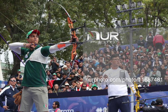 Kim Woojin of Korea and Matias Grande of Mexico compete during the Men's recurve semifinals match on the final day of the Tlaxcala 2024 Arch...