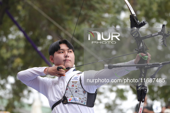 Lee Woo-Seok of Korea competes against Marcus D'Almeida of Brazil (not in picture) during the Men's recurve semifinals match on the final da...