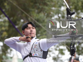 Lee Woo-Seok of Korea competes against Marcus D'Almeida of Brazil (not in picture) during the Men's recurve semifinals match on the final da...