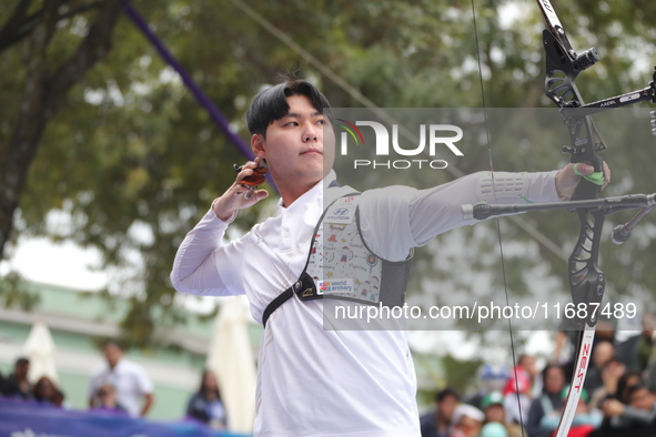 Lee Woo-Seok of Korea competes against Marcus D'Almeida of Brazil (not in picture) during the Men's recurve semifinals match on the final da...