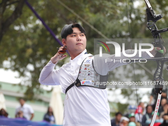 Lee Woo-Seok of Korea competes against Marcus D'Almeida of Brazil (not in picture) during the Men's recurve semifinals match on the final da...