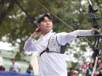 Lee Woo-Seok of Korea competes against Marcus D'Almeida of Brazil (not in picture) during the Men's recurve semifinals match on the final da...