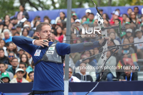 Marcus D'Almeida of Brazil competes against Lee Woo-Seok of Korea (not in picture) during the Men's recurve semifinals match on the final da...