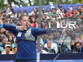 Marcus D'Almeida of Brazil competes against Lee Woo-Seok of Korea (not in picture) during the Men's recurve semifinals match on the final da...