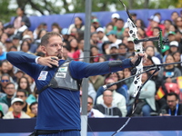 Marcus D'Almeida of Brazil competes against Lee Woo-Seok of Korea (not in picture) during the Men's recurve semifinals match on the final da...