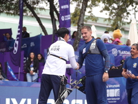 Lee Woo-Seok of Korea and Marcus D'Almeida of Brazil compete during the Men's recurve semifinals match on the final day of the Tlaxcala 2024...