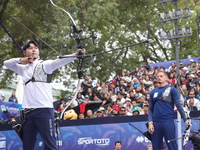 Lee Woo-Seok of Korea and Marcus D'Almeida of Brazil compete during the Men's recurve semifinals match on the final day of the Tlaxcala 2024...