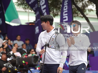 Lee Woo-Seok of Korea competes against Marcus D'Almeida of Brazil (not in picture) during the Men's recurve semifinals match on the final da...