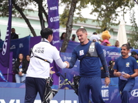 Lee Woo-Seok of Korea and Marcus D'Almeida of Brazil compete during the Men's recurve semifinals match on the final day of the Tlaxcala 2024...