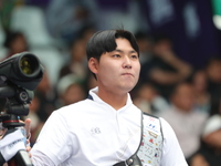 Lee Woo-Seok of Korea competes against Marcus D'Almeida of Brazil (not in picture) during the Men's recurve semifinals match on the final da...