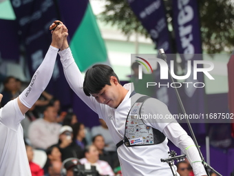 Lee Woo-Seok of Korea competes against Marcus D'Almeida of Brazil (not in picture) during the Men's recurve semifinals match on the final da...