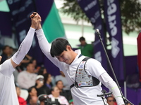 Lee Woo-Seok of Korea competes against Marcus D'Almeida of Brazil (not in picture) during the Men's recurve semifinals match on the final da...