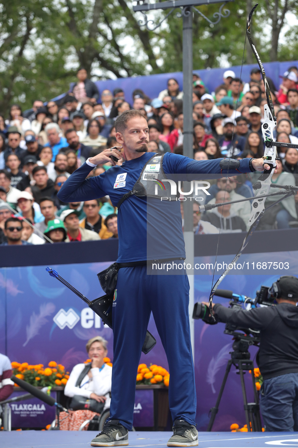 Marcus D'Almeida of Brazil competes against Lee Woo-Seok of Korea (not in picture) during the Men's recurve semifinals match on the final da...