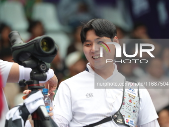 Lee Woo-Seok of Korea competes against Marcus D'Almeida of Brazil (not in picture) during the Men's recurve semifinals match on the final da...