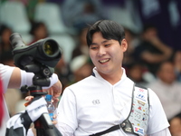 Lee Woo-Seok of Korea competes against Marcus D'Almeida of Brazil (not in picture) during the Men's recurve semifinals match on the final da...