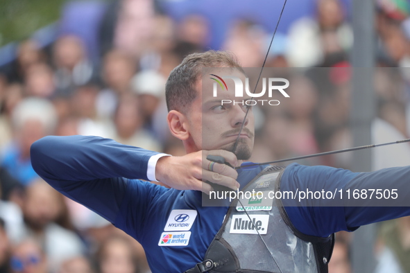 Marcus D'Almeida of Brazil competes against Lee Woo-Seok of Korea (not in picture) during the Men's recurve semifinals match on the final da...