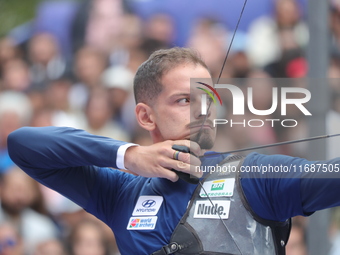 Marcus D'Almeida of Brazil competes against Lee Woo-Seok of Korea (not in picture) during the Men's recurve semifinals match on the final da...