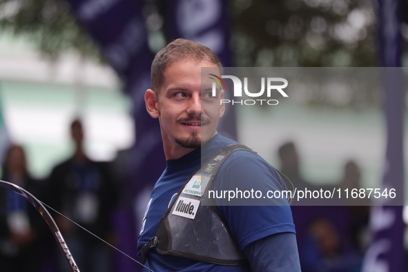 Marcus D'Almeida of Brazil competes against Matias Grande of Mexico (not in picture) during the Men's recurve 3rd place match on the final d...