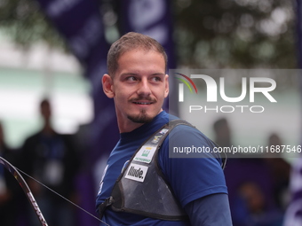 Marcus D'Almeida of Brazil competes against Matias Grande of Mexico (not in picture) during the Men's recurve 3rd place match on the final d...