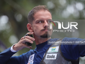 Marcus D'Almeida of Brazil competes against Matias Grande of Mexico (not in picture) during the Men's recurve 3rd place match on the final d...