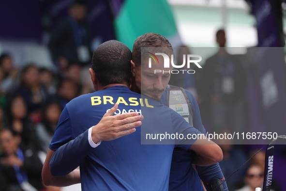 Marcus D'Almeida of Brazil competes against Matias Grande of Mexico (not in picture) during the Men's recurve 3rd place match on the final d...