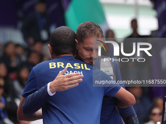 Marcus D'Almeida of Brazil competes against Matias Grande of Mexico (not in picture) during the Men's recurve 3rd place match on the final d...