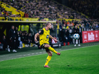 Julian Ryerson of Borussia Dortmund plays the ball during the Bundesliga match between Borussia Dortmund and FC St. Pauli 1910 at Signal Idu...