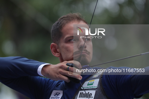 Marcus D'Almeida of Brazil competes against Matias Grande of Mexico (not in picture) during the Men's recurve 3rd place match on the final d...