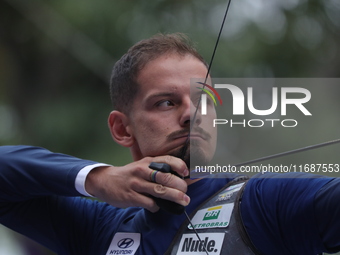 Marcus D'Almeida of Brazil competes against Matias Grande of Mexico (not in picture) during the Men's recurve 3rd place match on the final d...