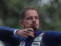 Marcus D'Almeida of Brazil competes against Matias Grande of Mexico (not in picture) during the Men's recurve 3rd place match on the final d...