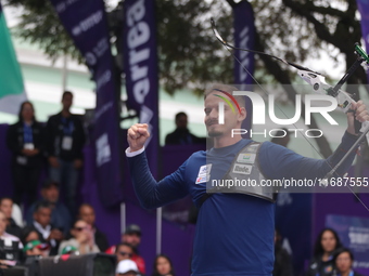 Marcus D'Almeida of Brazil competes against Matias Grande of Mexico (not in picture) during the Men's recurve 3rd place match on the final d...