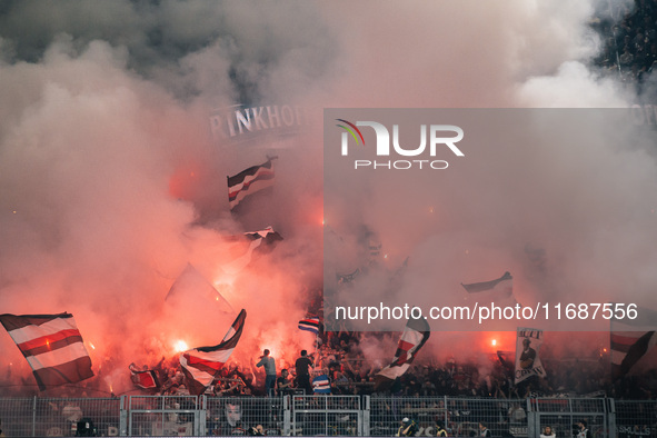 Fans of FC St. Pauli 1910 ignite pyro during the Bundesliga match between Borussia Dortmund and FC St. Pauli 1910 at Signal Iduna Park in Do...