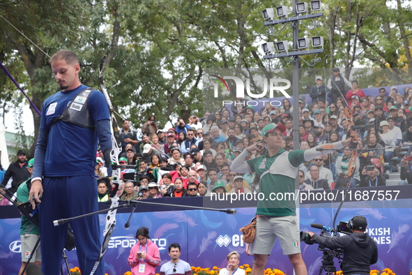 Marcus D'Almeida of Brazil and Matias Grande of Mexico compete during the Men's recurve 3rd place match on the final day of the Tlaxcala 202...