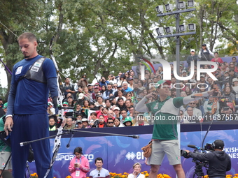 Marcus D'Almeida of Brazil and Matias Grande of Mexico compete during the Men's recurve 3rd place match on the final day of the Tlaxcala 202...