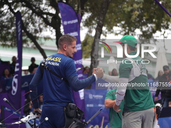 Marcus D'Almeida of Brazil and Matias Grande of Mexico compete during the Men's recurve 3rd place match on the final day of the Tlaxcala 202...