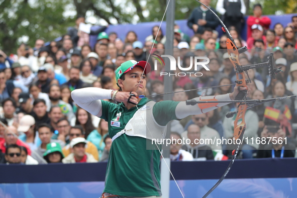 Matias Grande of Mexico competes against Marcus D'Almeida of Brazil (not in picture) during the Men's recurve 3rd place match on the final d...