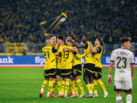 Players of Borussia Dortmund celebrate after scoring the first goal during the Bundesliga match between Borussia Dortmund and FC St. Pauli 1...