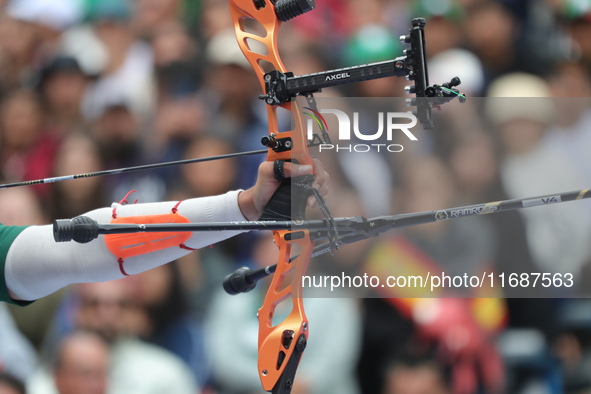 Matias Grande of Mexico competes against Marcus D'Almeida of Brazil (not in picture) during the Men's recurve 3rd place match on the final d...