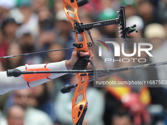 Matias Grande of Mexico competes against Marcus D'Almeida of Brazil (not in picture) during the Men's recurve 3rd place match on the final d...